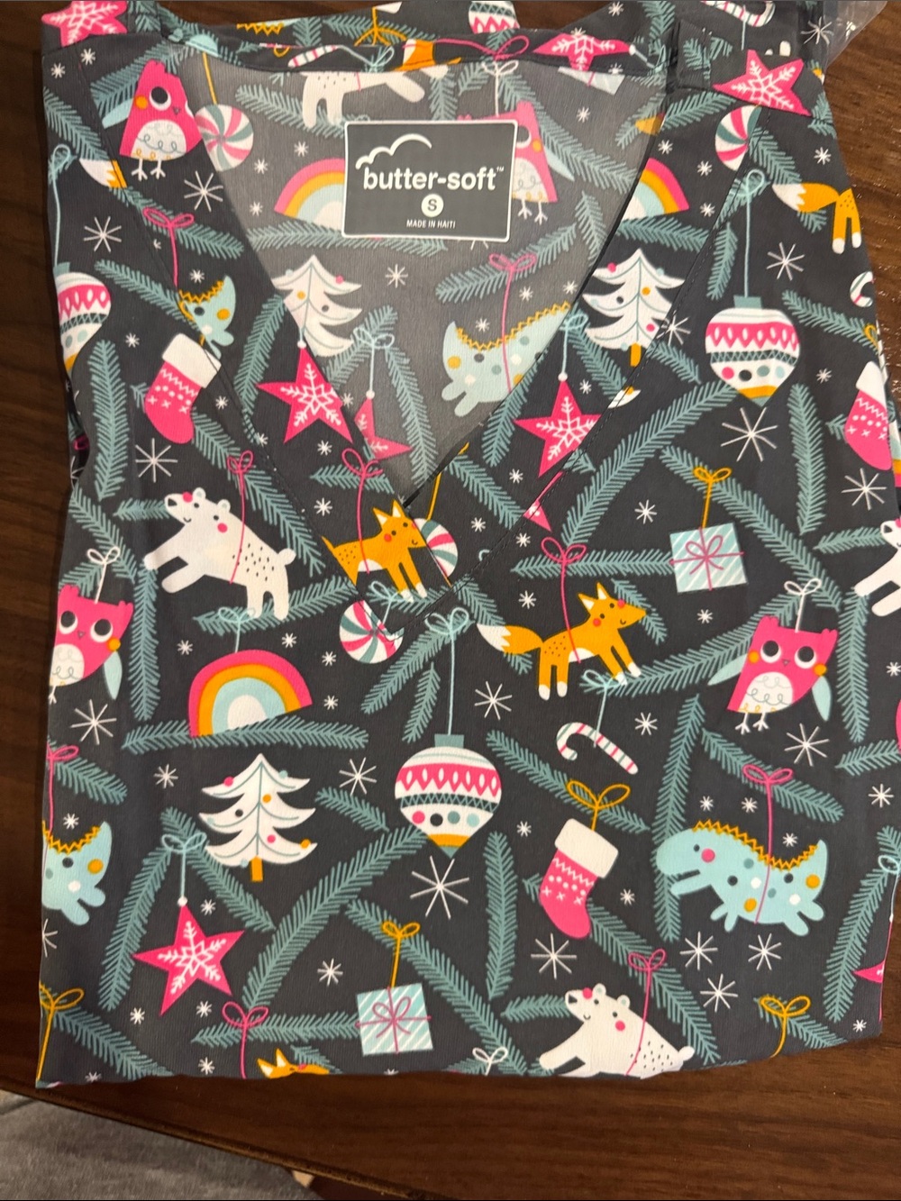 Butter soft scrub top in charcoal with pink, teal & yellow holiday print